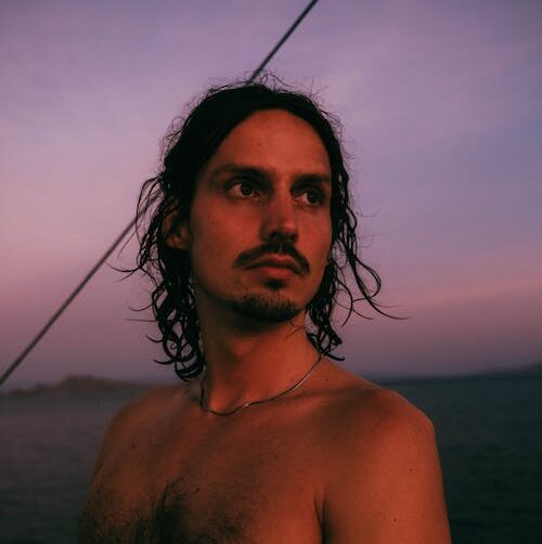 free photo of bare chested man on the sea e1702466251850 - Rosario Nautico